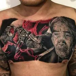Aaron Olaguivel (Omom Tattoo)