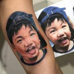 Aaron Olaguivel (Omom Tattoo)